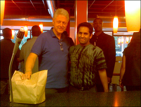 Bill Clinton with Z Burger owner Peter Tabibian at the Tenleytown restaurant Saturday night. (Photo - Peter Tabibian, Washington Post)