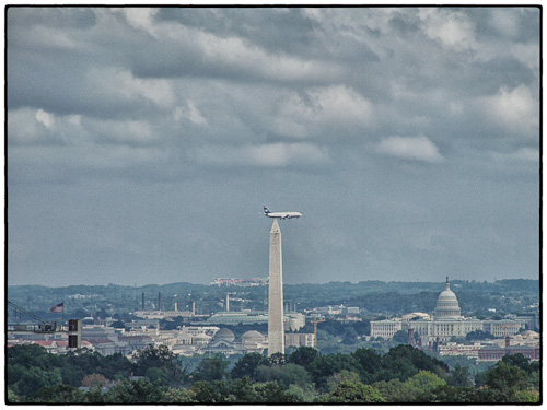 Watching climbers check the Washington Monument from our living room.