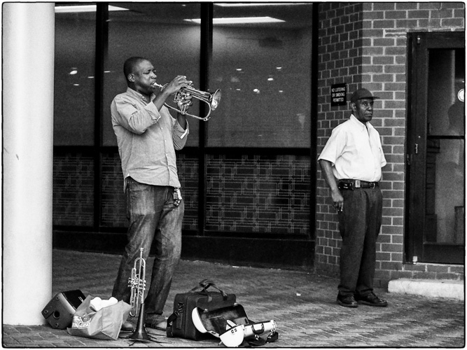 At the Metro stop. He sounds good - and yes - I support my local street musicians.