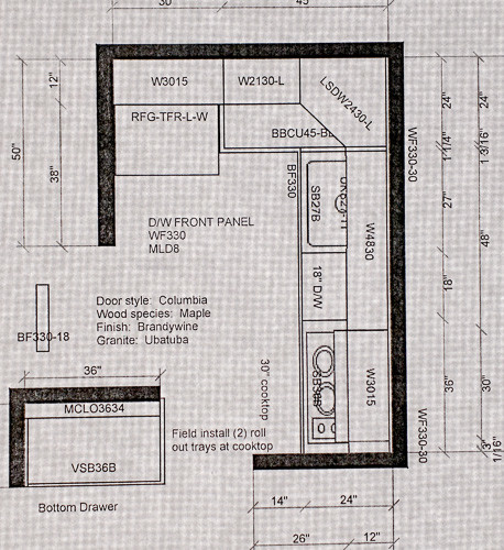 The kitchen plan was taped to the window.