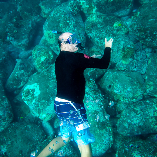 My swimming partner checking out the sea floor