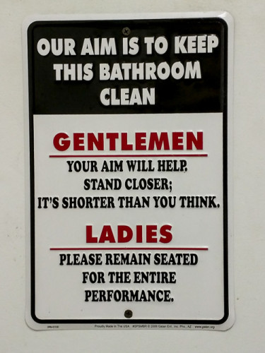 Sign in the impeccably clean unisex bathroom.