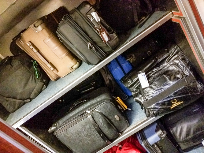 Our luggage rack - there is ZERO room in the small rooms for luggage.
