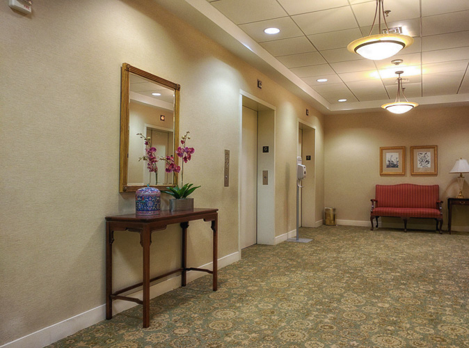 What management thinks the inmates see in the garage lobby - tasteful granny furniture.