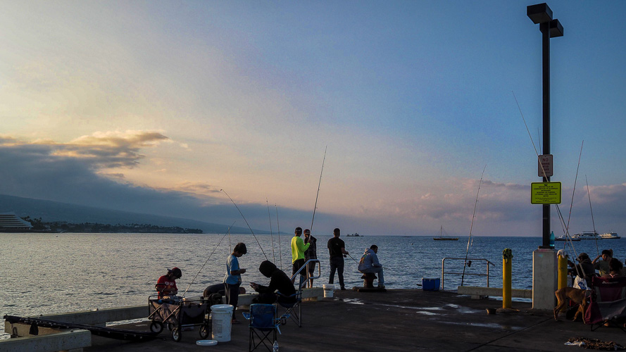 Sunrise in our little drinking village with a fishing problem.